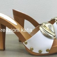 Creazioni Katia zoccoli sexy tacco 10 in legno e pelle con fiocco