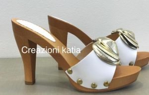 Creazioni Katia zoccoli sexy tacco 10 in legno e pelle con fiocco